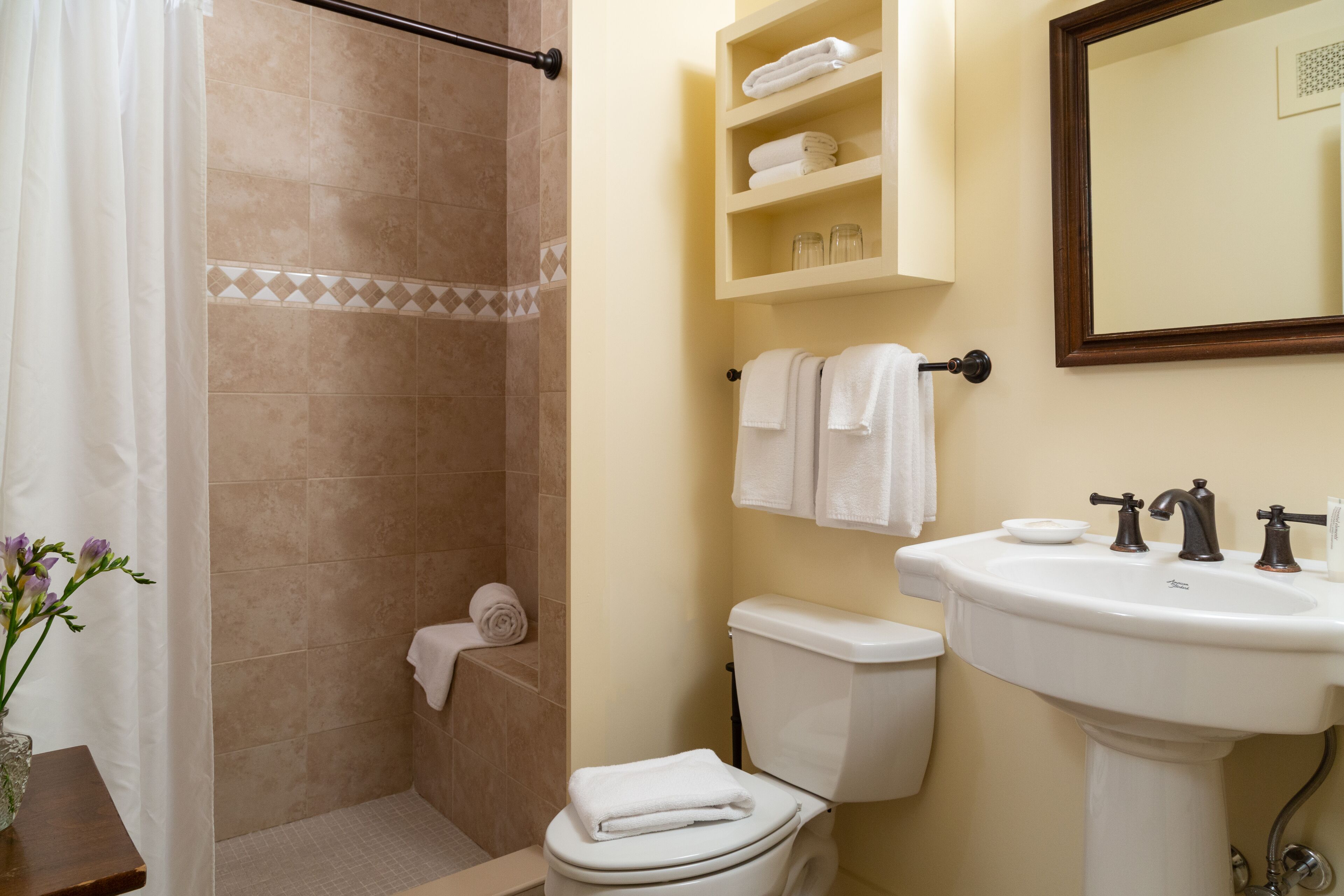 village room, 1 queen bed | bathroom | free toiletries, hair dryer, towels