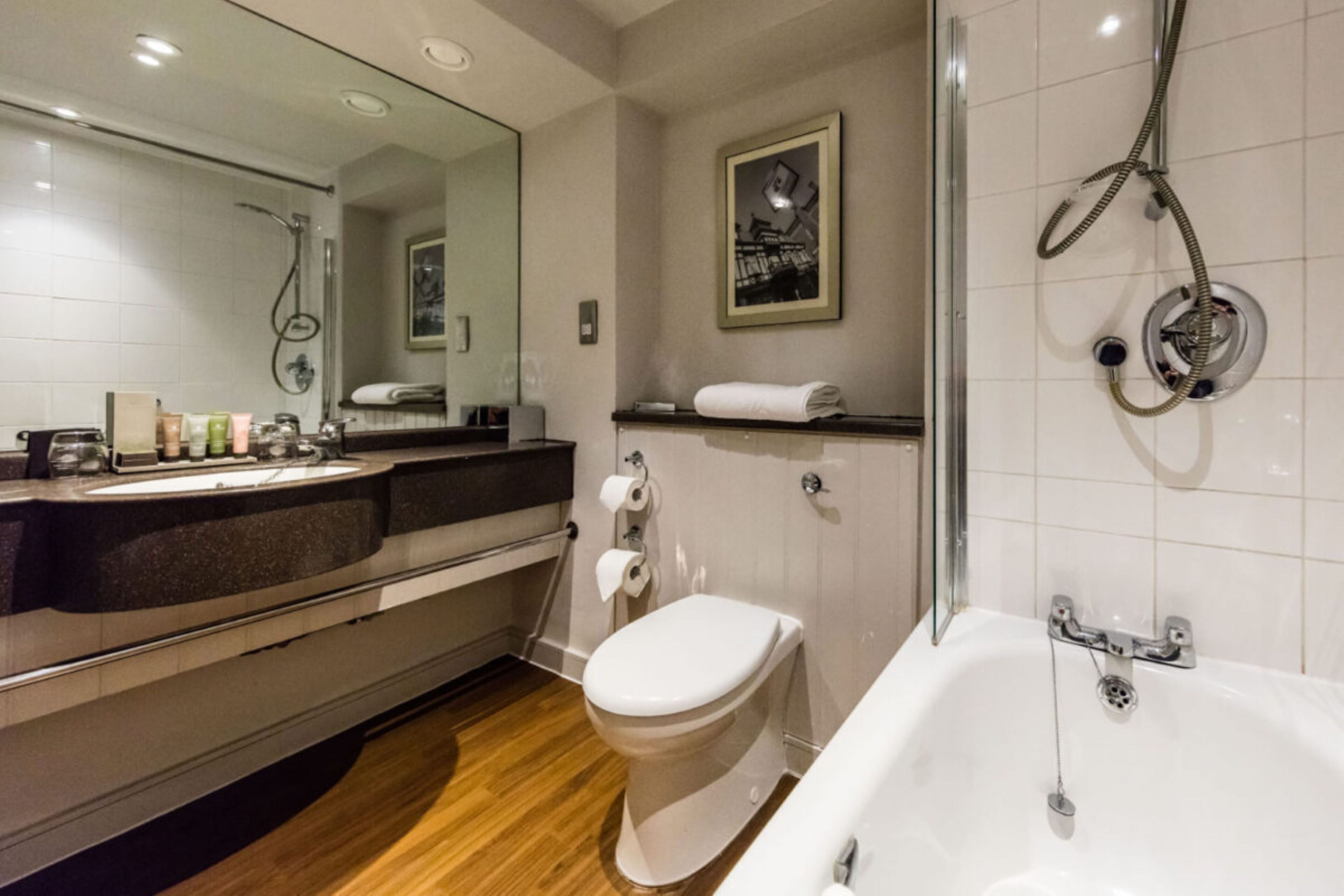 classic twin room | bathroom | combined shower/bathtub, free toiletries, hair dryer, towels