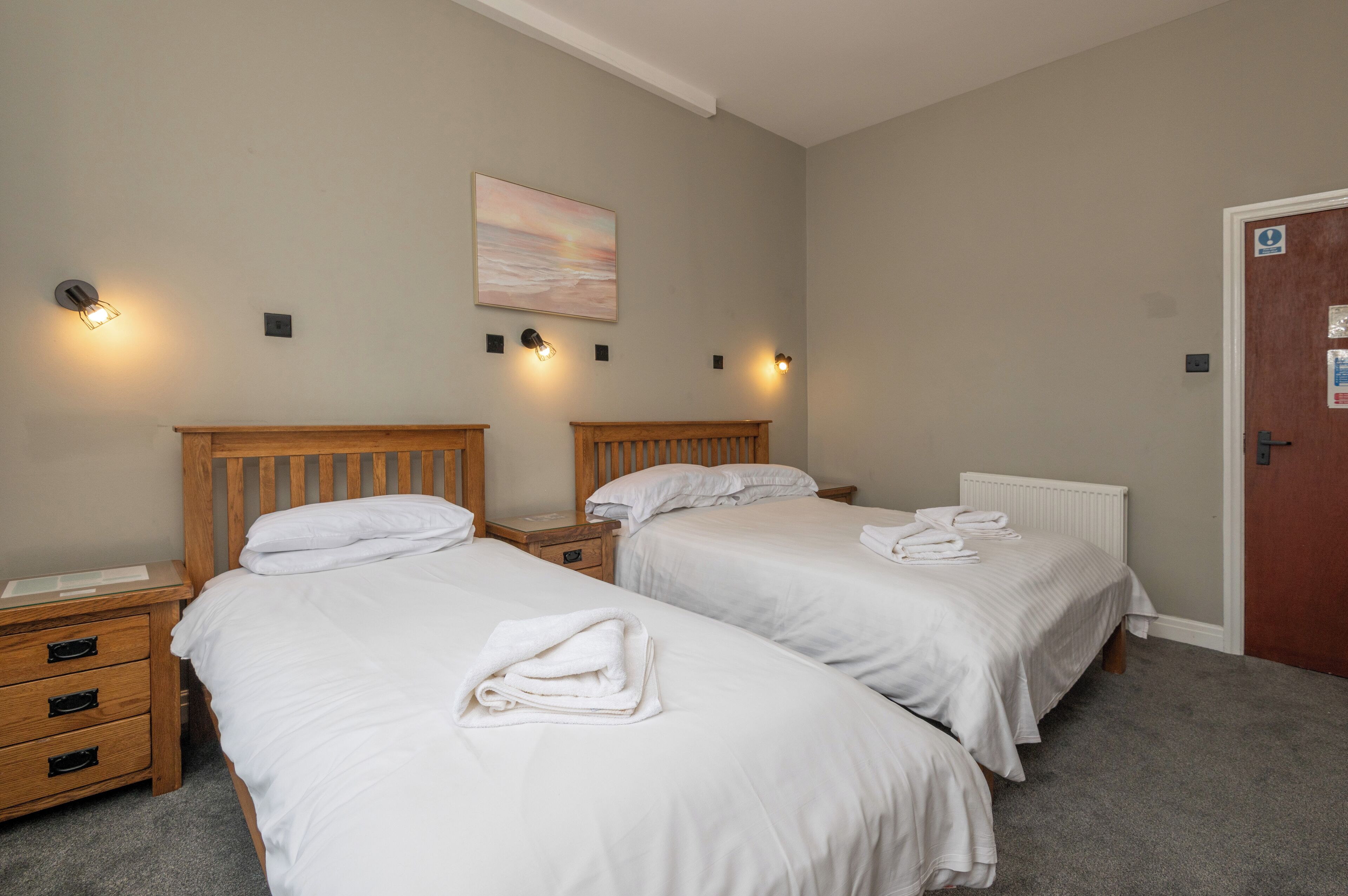 room | premium bedding, select comfort beds, desk, blackout curtains