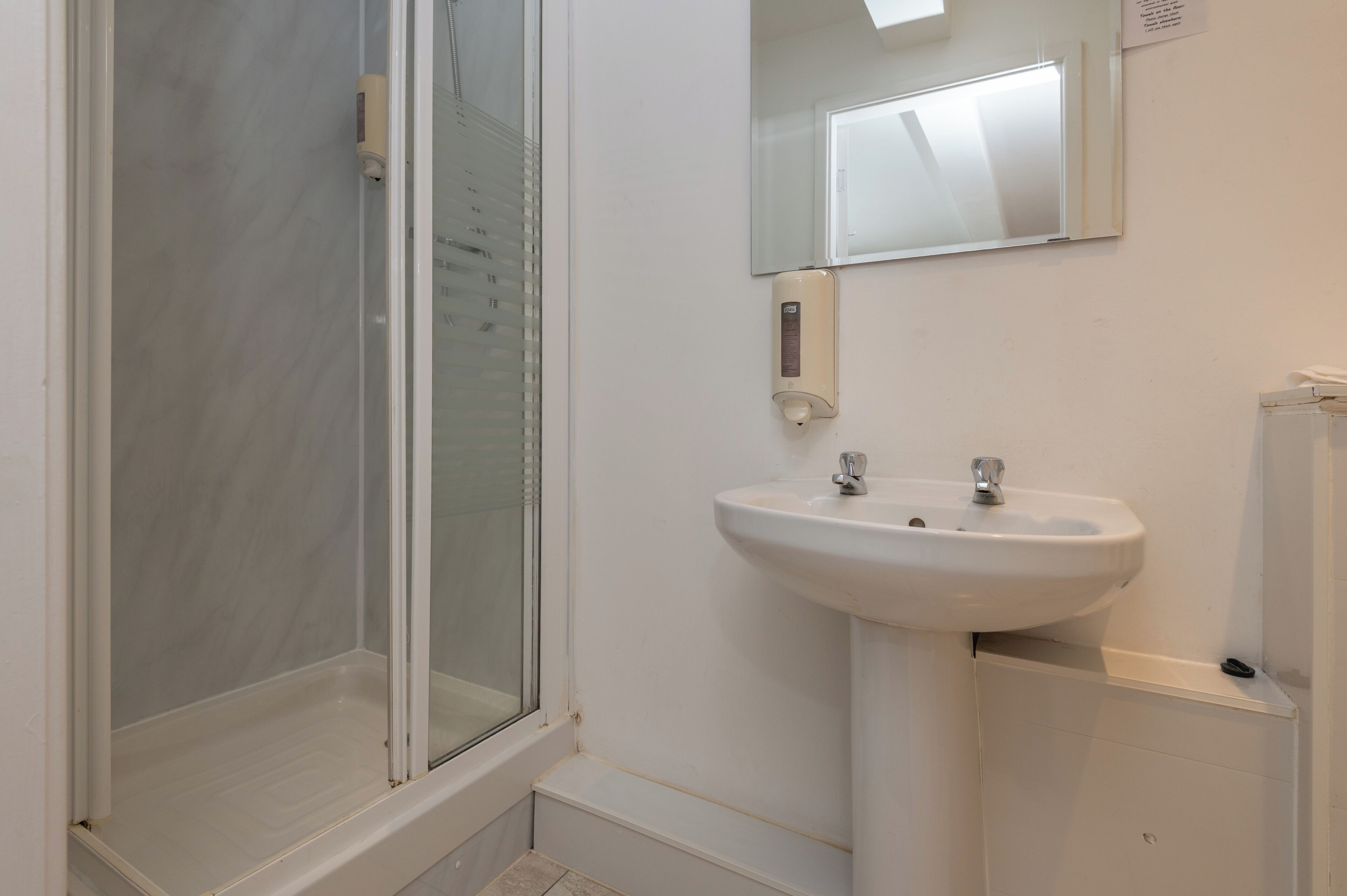 standard twin room | bathroom | shower, hair dryer, towels
