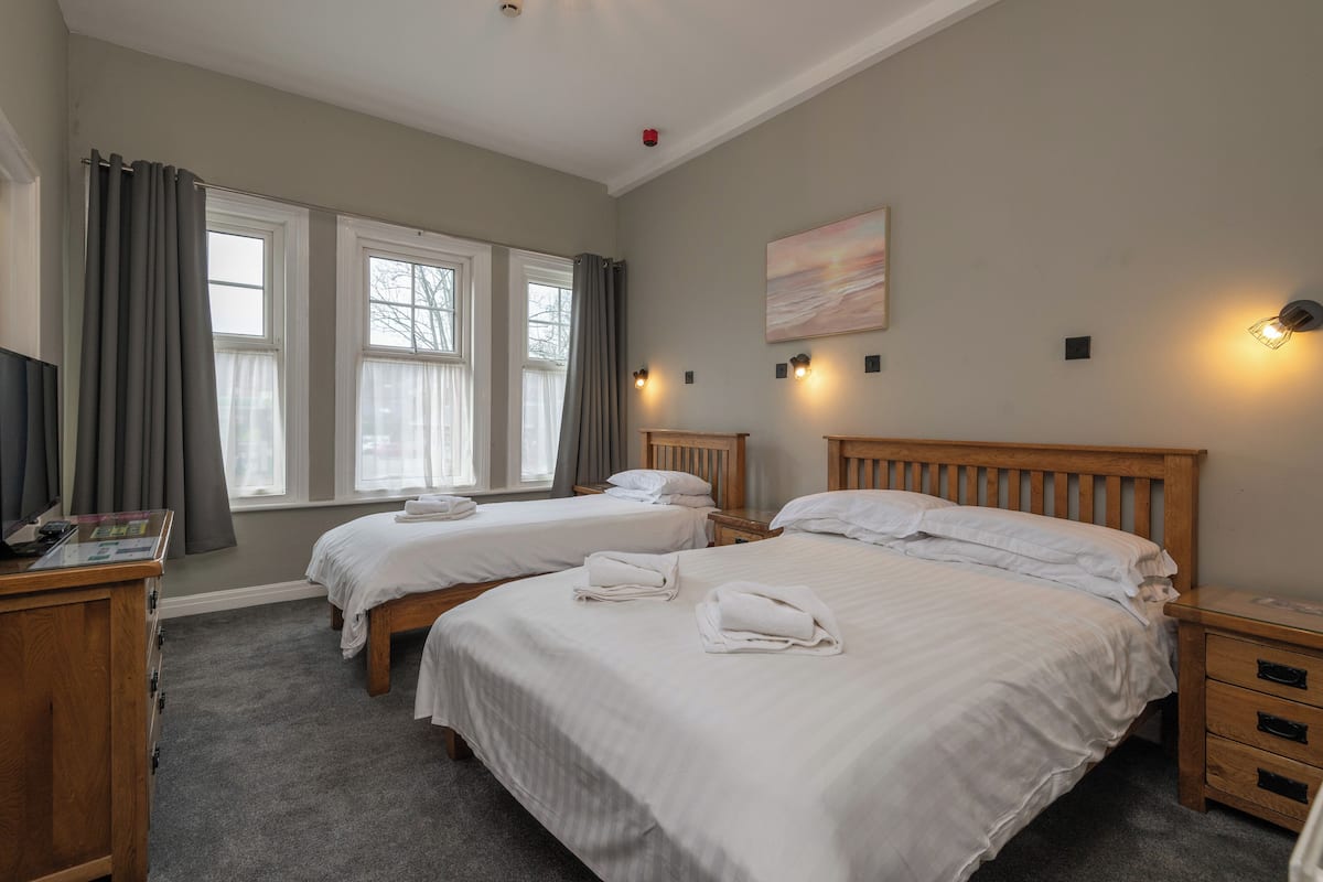 room | premium bedding, select comfort beds, desk, blackout curtains