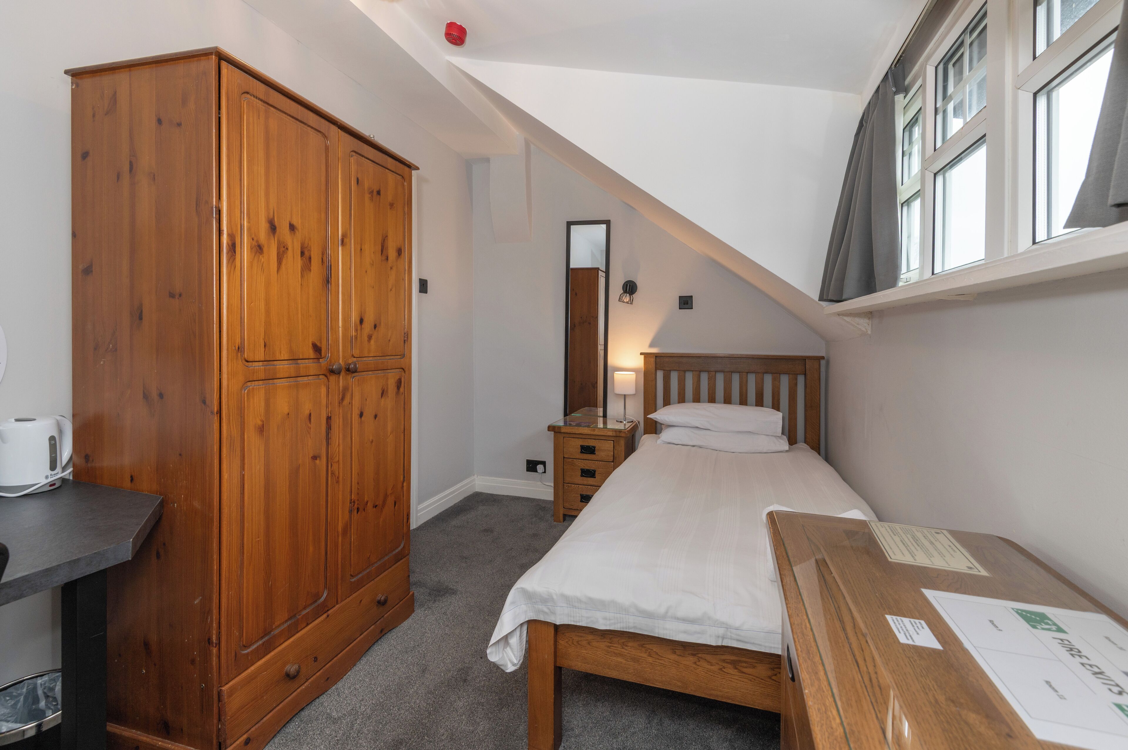 room | premium bedding, select comfort beds, desk, blackout curtains