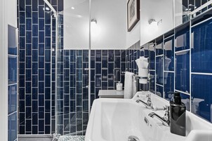 Superior Double Room | Bathroom | Designer toiletries, hair dryer, bathrobes, slippers