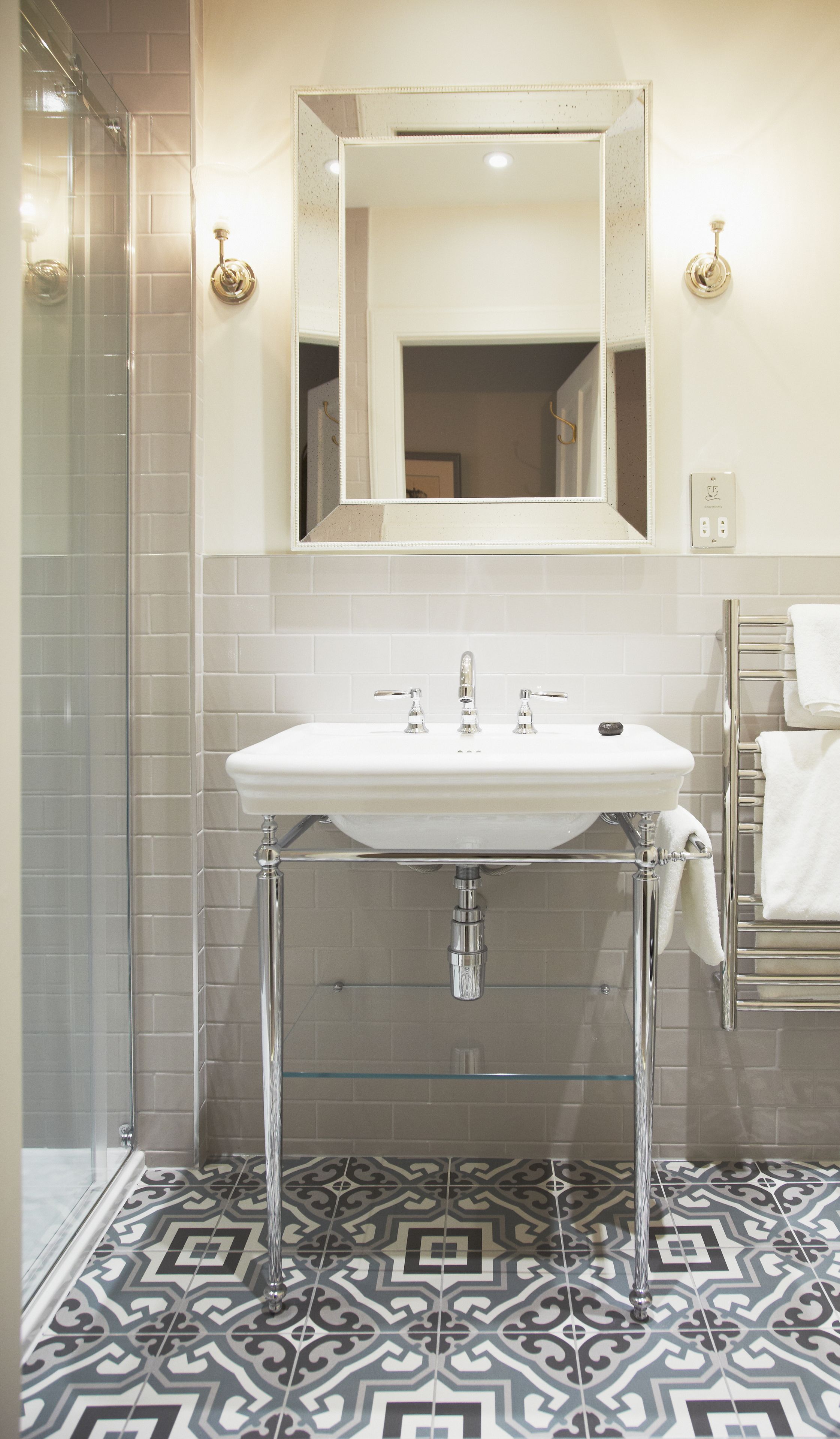 designer toiletries, hair dryer, bathrobes, heated floors