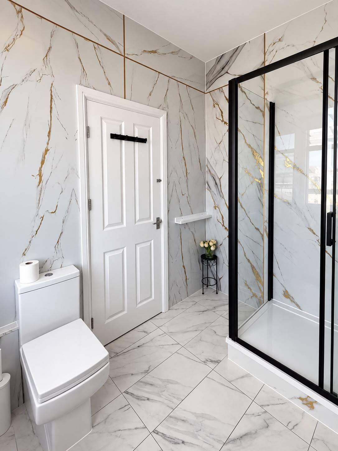 A bathroom with a toilet, a shower enclosure, and marble-patterned walls.