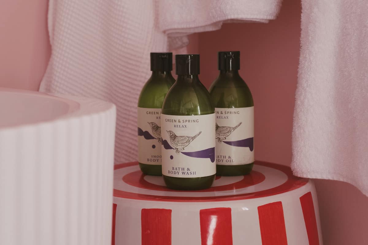 luxury double room, 1 king bed, bathtub, sea view | bathroom | designer toiletries, hair dryer, bathrobes, slippers