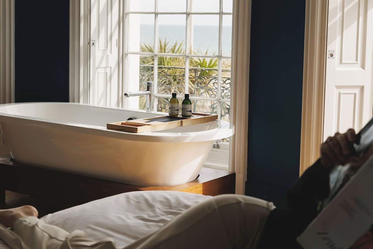 signature double room, 1 king bed, sea facing | bathroom | designer toiletries, hair dryer, bathrobes, slippers