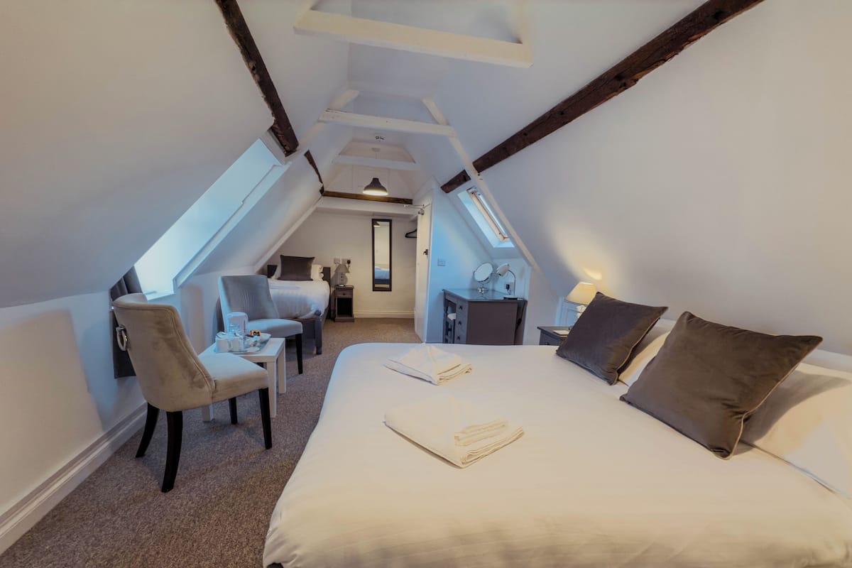 Superior Triple Room, Multiple Beds (Attic) | In-room safe, desk, blackout drapes, iron/ironing board