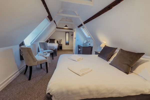 Superior Triple Room, Multiple Beds (Attic) | In-room safe, desk, blackout drapes, iron/ironing board