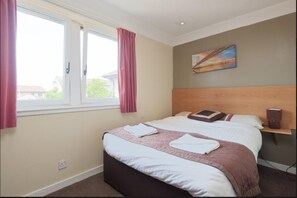 Rideaux occultants, fer et planche à repasser, Wi-Fi gratuit