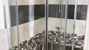 Shower, free toiletries, hair dryer, towels