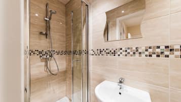 Shower, free toiletries, hair dryer, towels