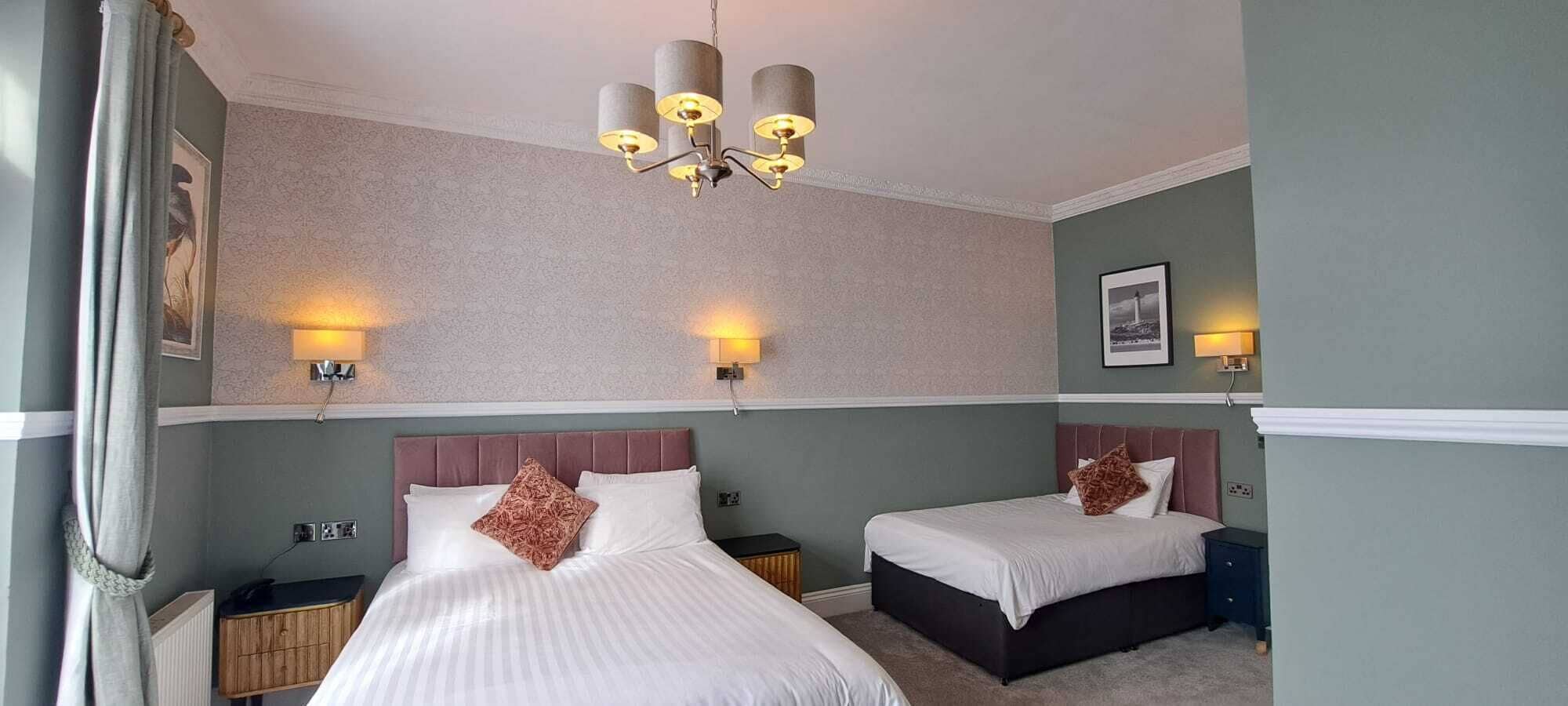 family room (2 beds - sleeps 3) | hypo-allergenic bedding, iron/ironing board, travel cot, free wifi