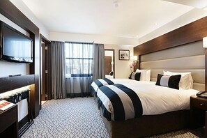 Premium bedding, in-room safe, desk, soundproofing