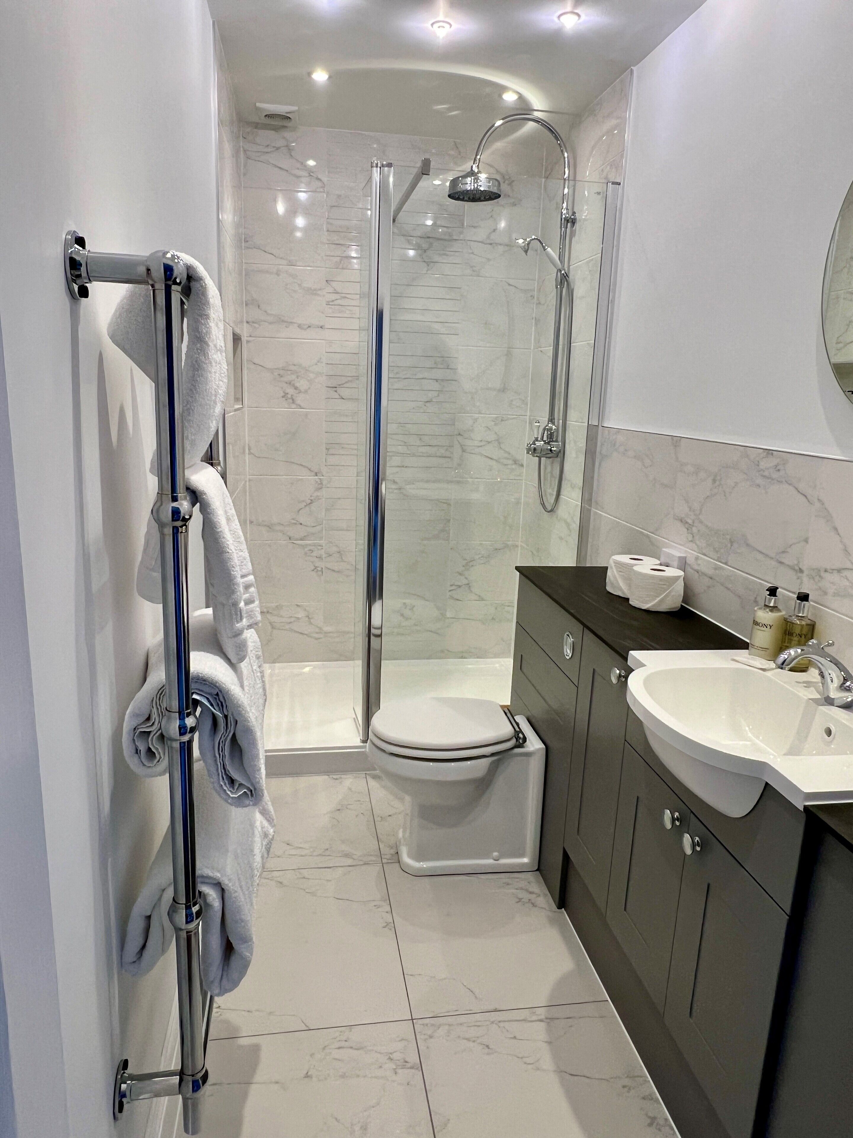 four poster | bathroom | hair dryer, towels