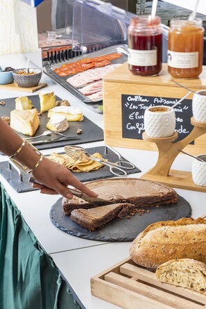 Daily buffet breakfast (EUR 12 per person)