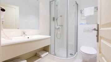 Hair dryer, towels, soap, shampoo