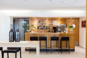 Enjoy a drink at the hotel bar, where a selection of beverages is available.
