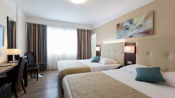Ropa de cama de alta calidad, colchones con pillow-top y minibar