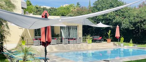 Outdoor pool, sun loungers