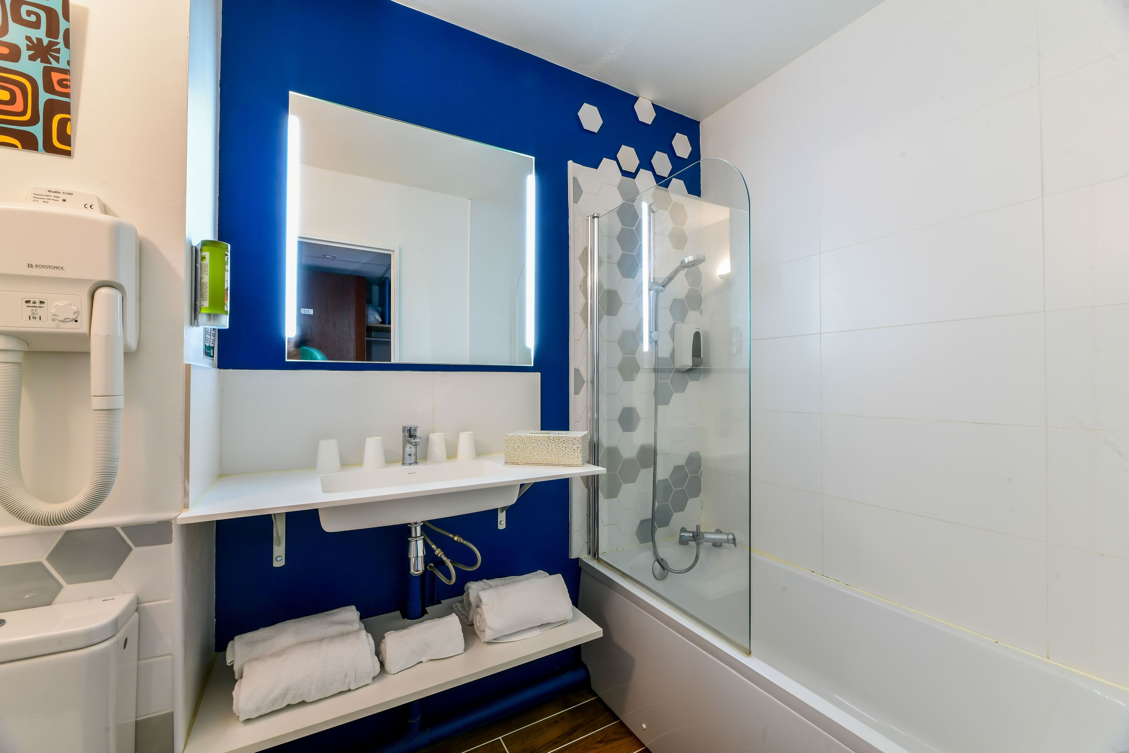 superior quadruple room | bathroom | hair dryer, towels