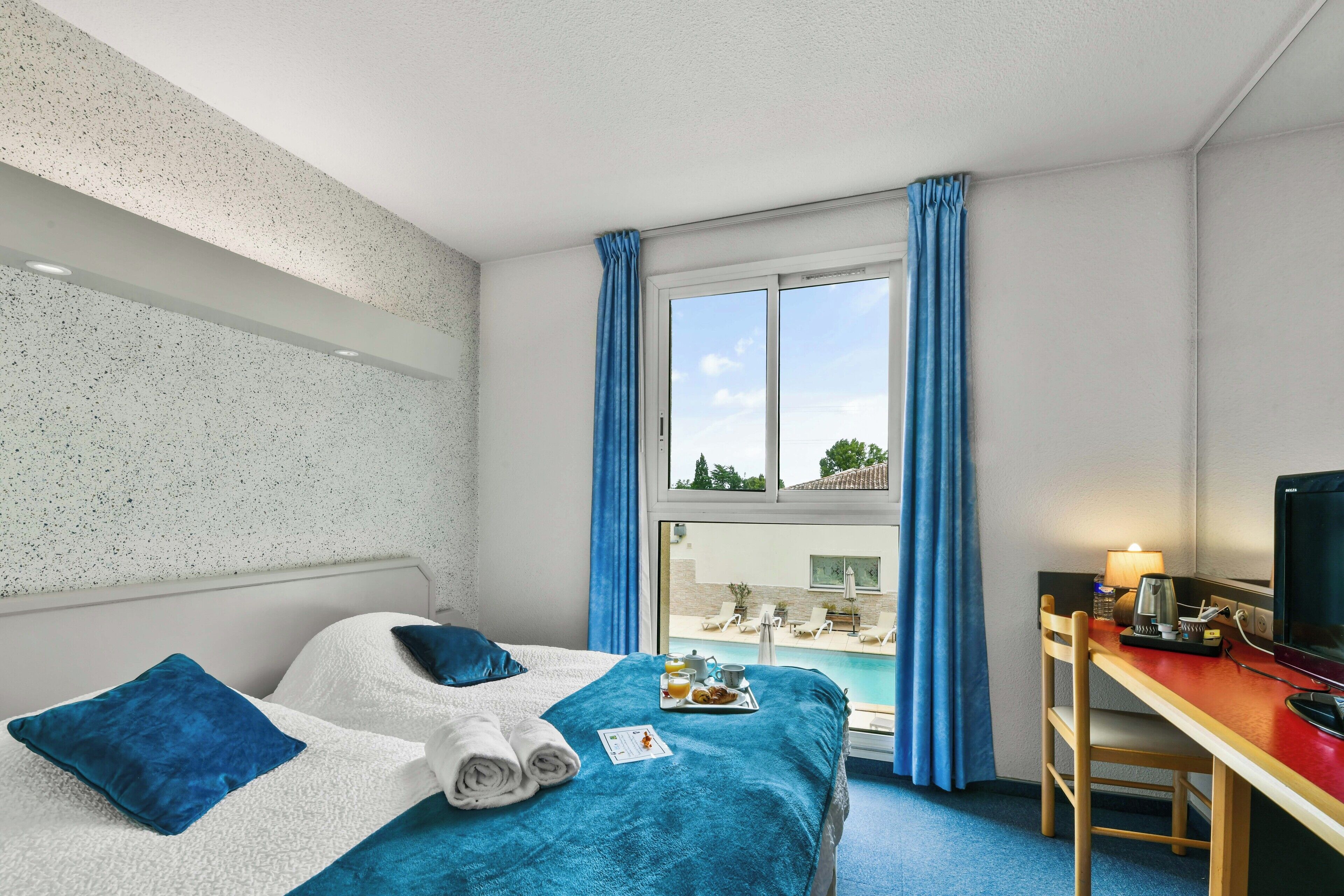 twin room, 2 single beds | in-room safe, desk, soundproofing, iron/ironing board