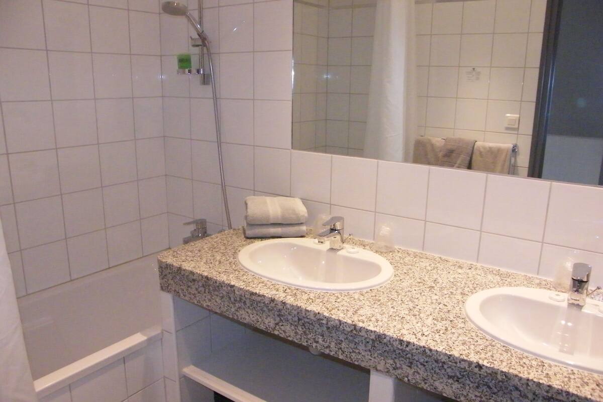 family duplex, 2 bedrooms, balcony, courtyard area | bathroom | free toiletries, hair dryer, towels, soap