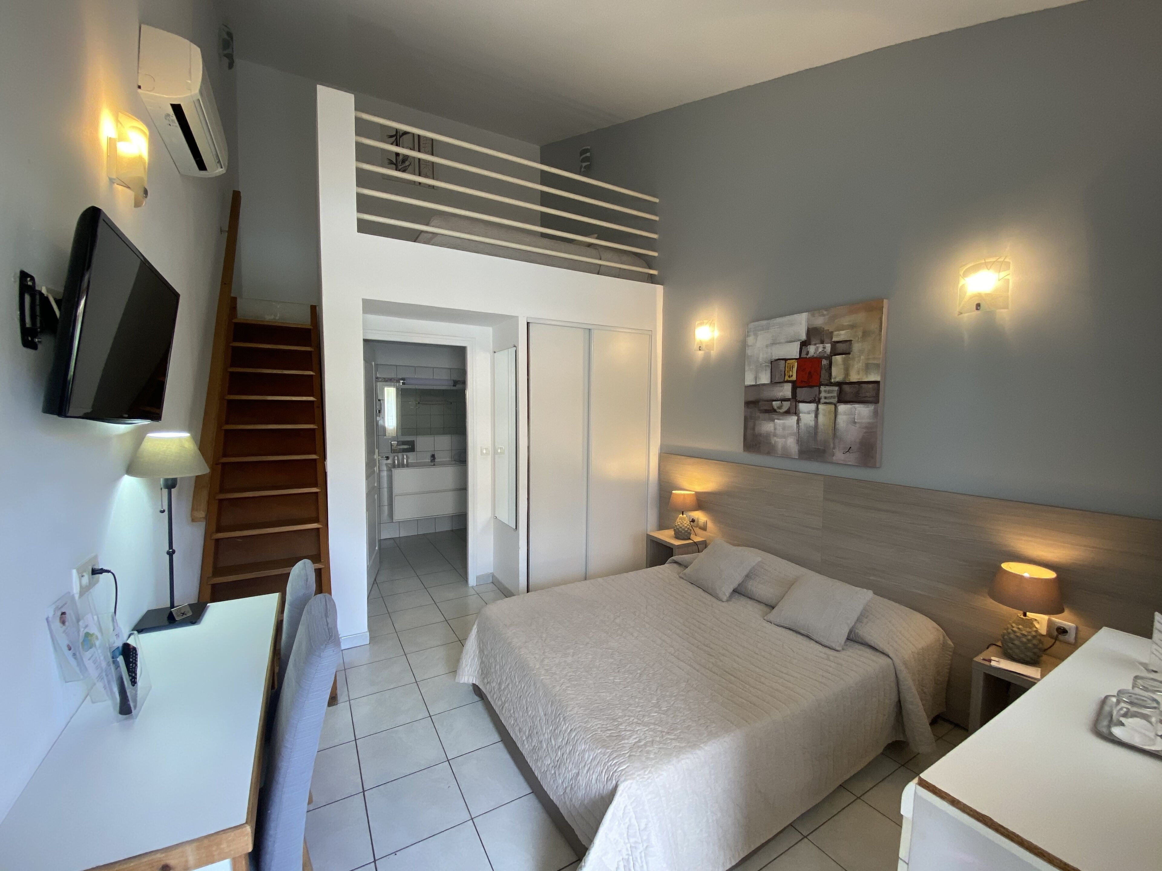 family quadruple room, terrace, ground floor | premium bedding, individually decorated, individually furnished, desk