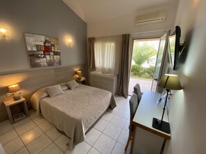 Family Quadruple Room, Terrace, Ground Floor | Premium bedding, individually decorated, individually furnished, desk