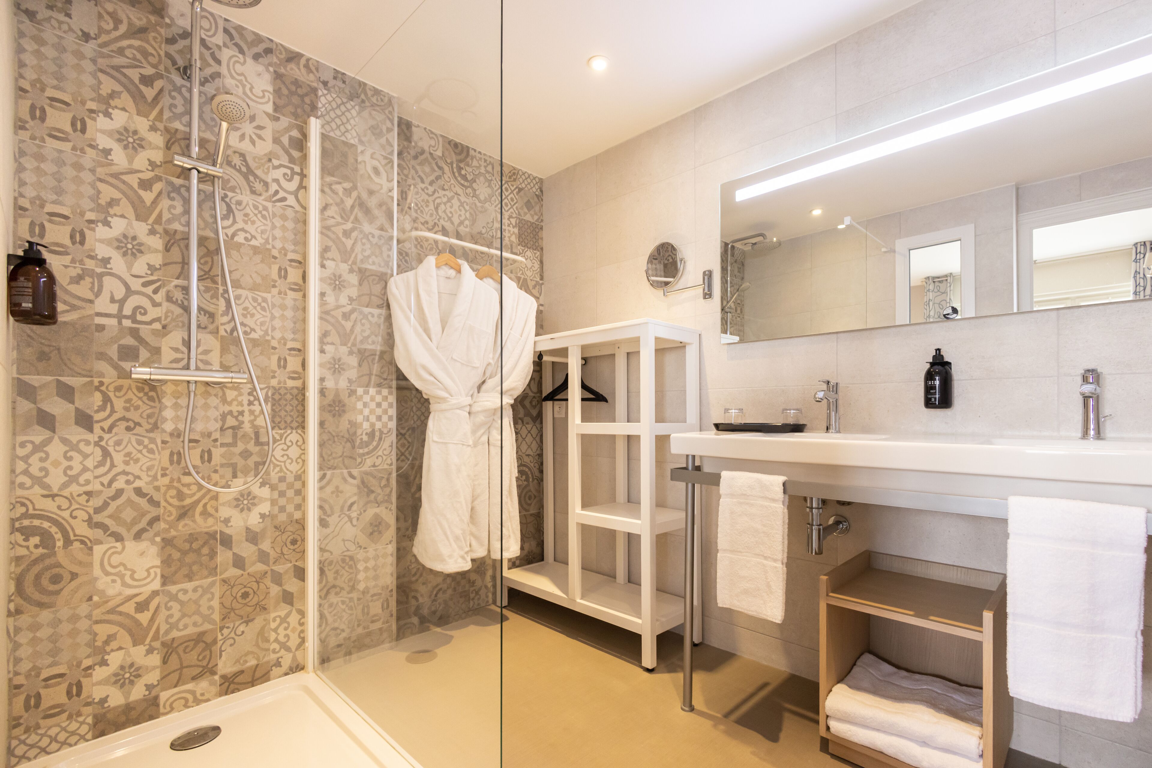 superior double room | bathroom | shower, rainfall showerhead, free toiletries, hair dryer