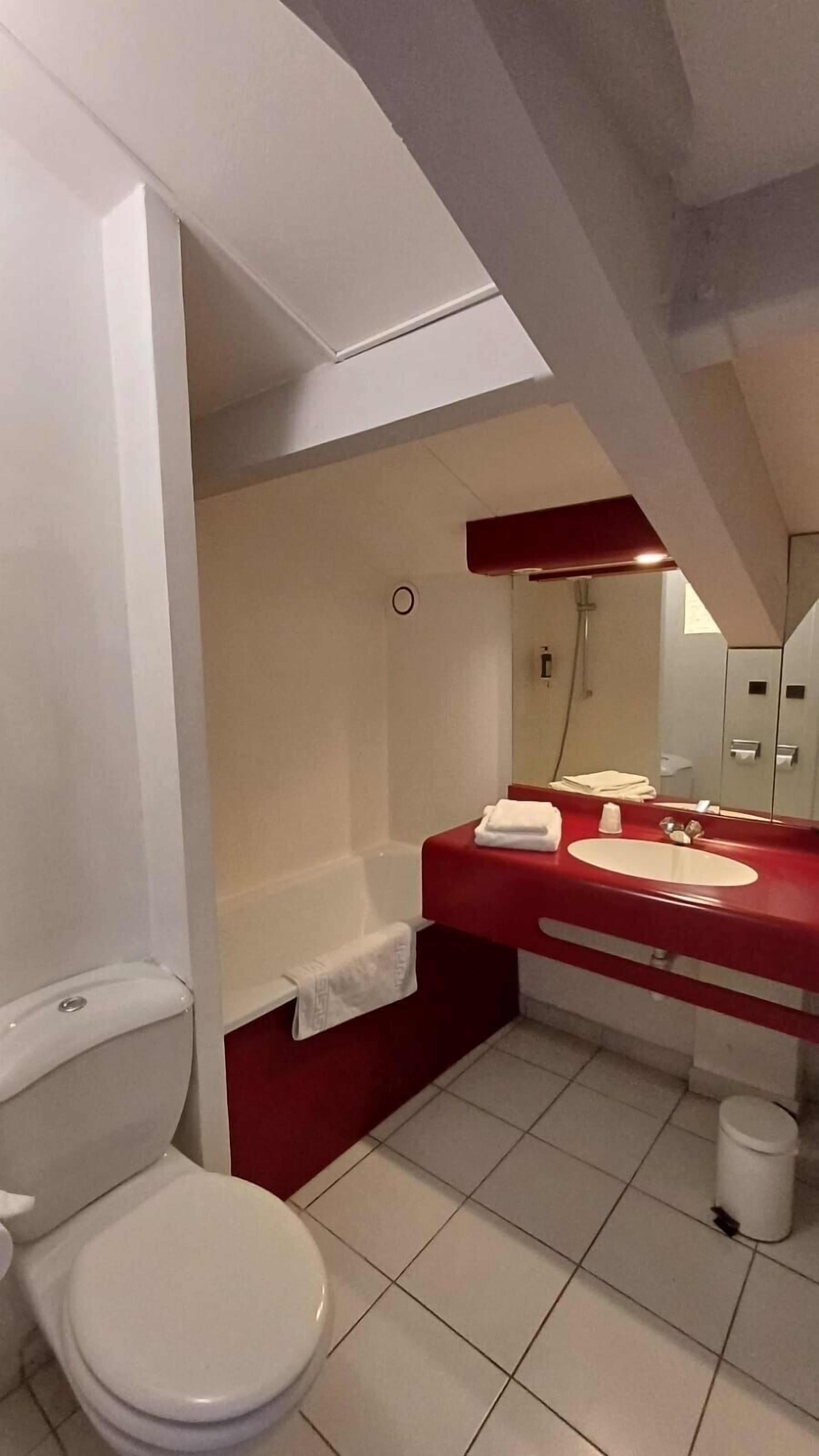 deep-soaking bathtub, hair dryer, towels