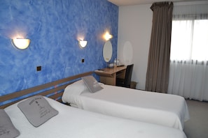 Desk, iron/ironing board, free WiFi, bed sheets