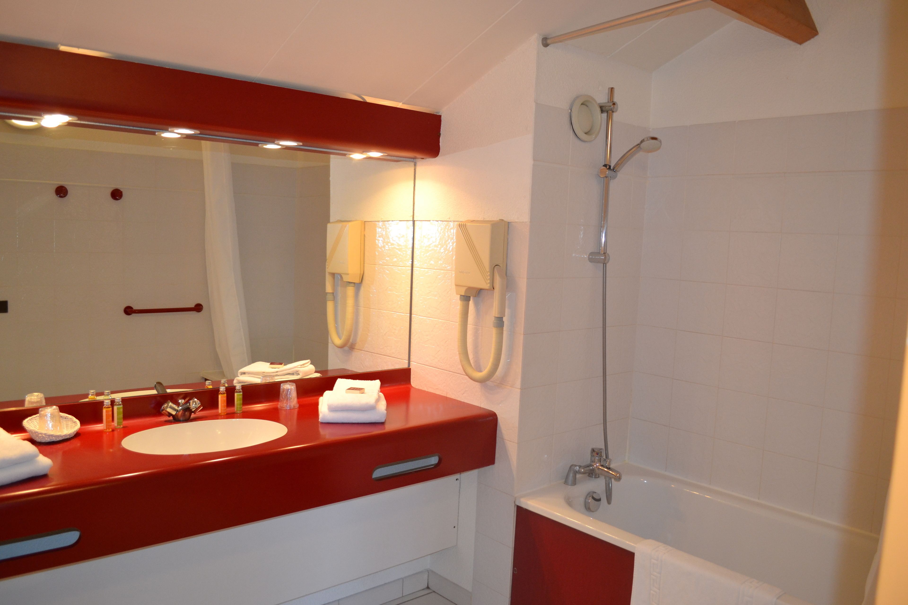 superior double room | bathroom | deep-soaking bathtub, hair dryer, towels