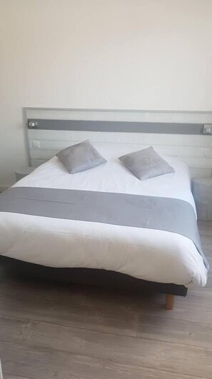 Desk, free WiFi, bed sheets
