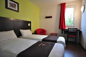 Desk, blackout curtains, free WiFi, bed sheets