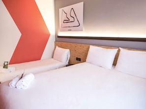 Premium bedding, desk, blackout curtains, soundproofing