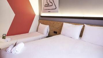 Premium bedding, desk, blackout drapes, soundproofing