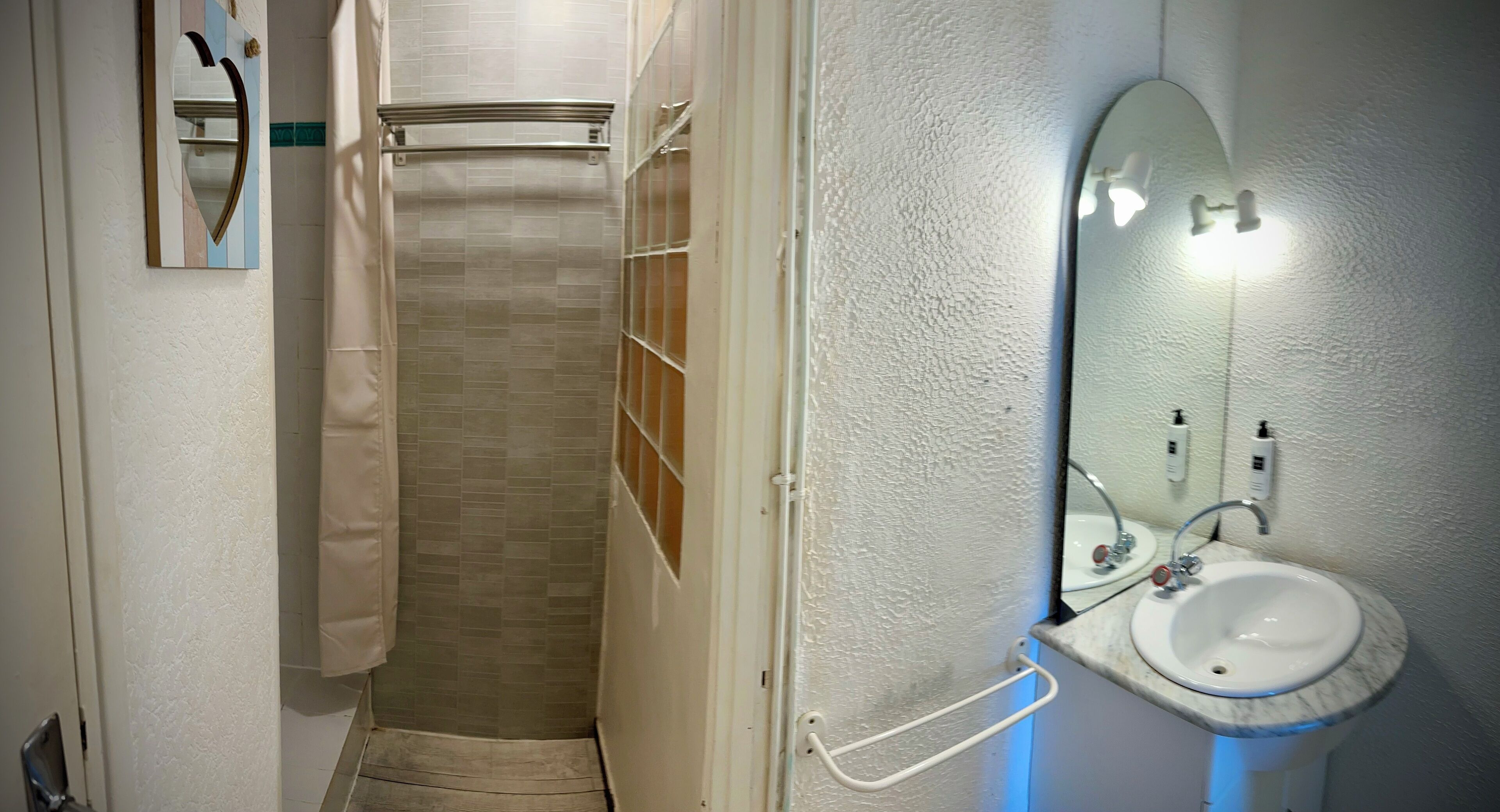 quadruple room (with air conditioning) | bathroom | shower, free toiletries, hair dryer, towels