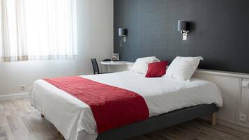 Minibar, desk, blackout drapes, soundproofing