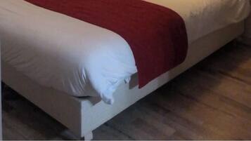 Desk, blackout drapes, soundproofing, free cribs/infant beds