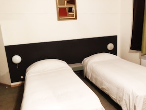 Room, 2 Twin Beds | Desk, blackout drapes, free cribs/infant beds, free WiFi - Welcomotel Montelimar (Montélimar)