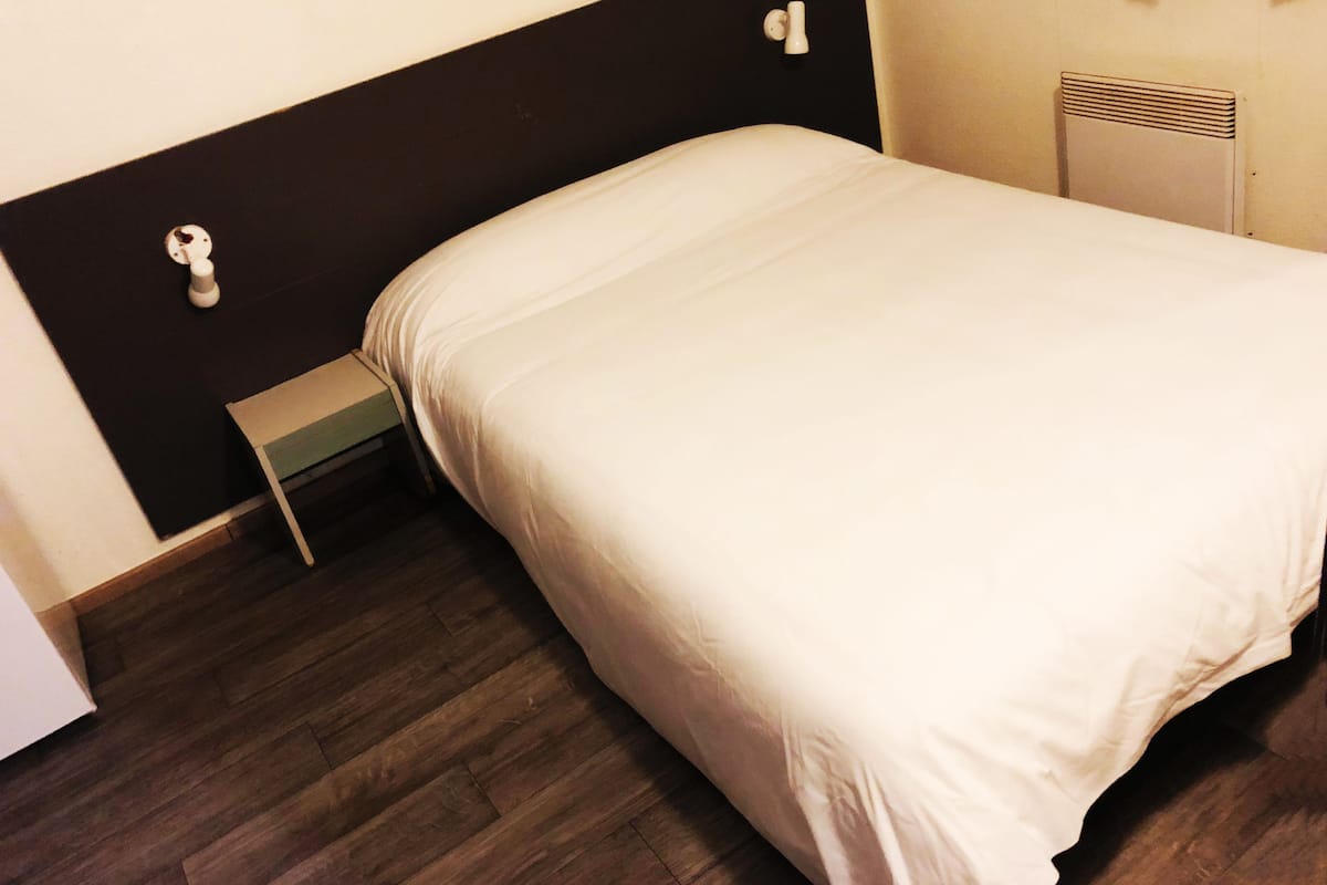 Desk, blackout drapes, cribs (free), WiFi (free)