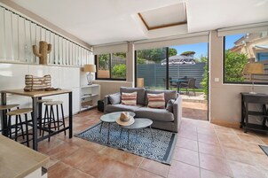 Apartment | Living area | 50-inch flat-screen TV with cable channels, TV