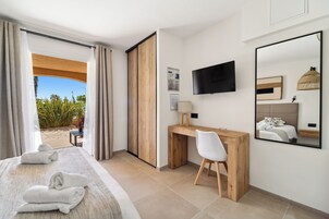 Standard Triple Room, Terrace (Garden View) | Free minibar items, in-room safe, desk, soundproofing