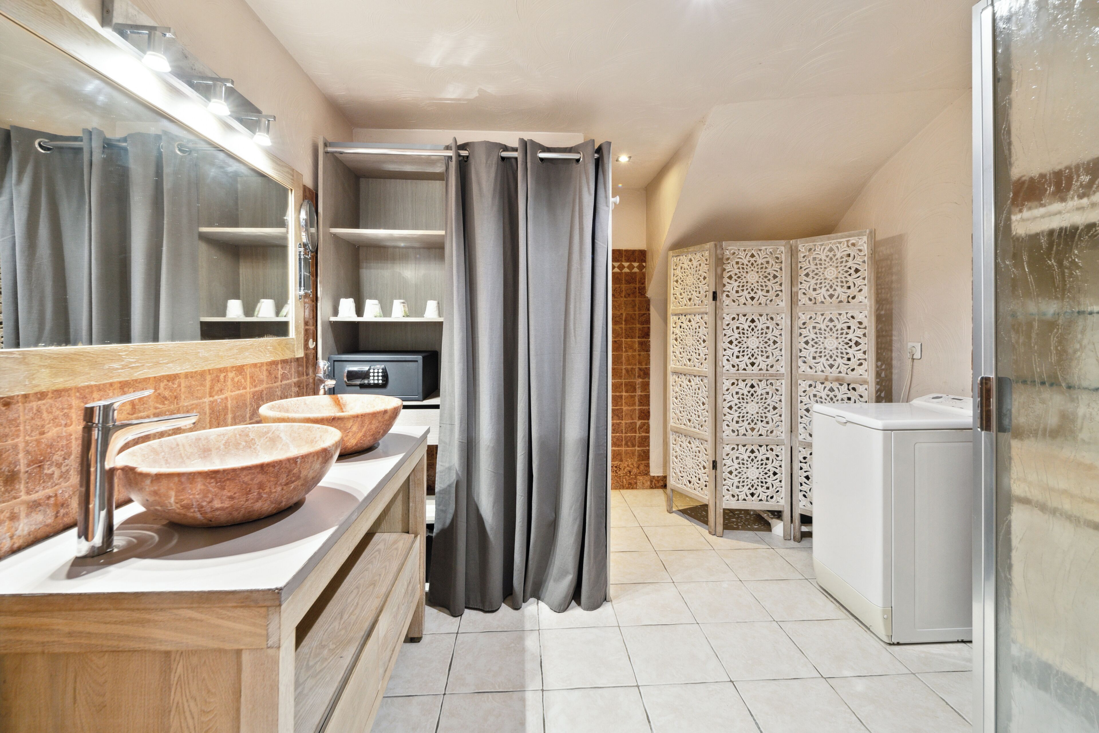 apartment | bathroom | hair dryer, towels, soap, shampoo