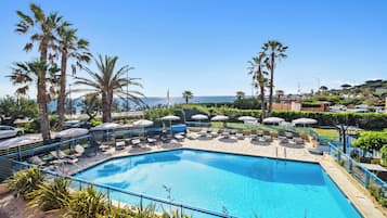 Outdoor pool, open 9:00 AM to 7:00 PM, pool umbrellas, pool loungers