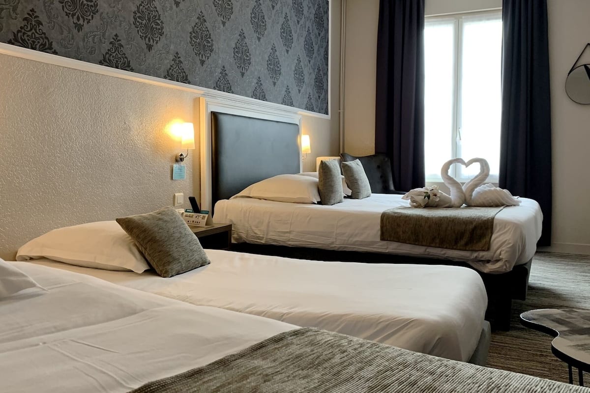 family room | premium bedding, individually decorated, desk, blackout curtains