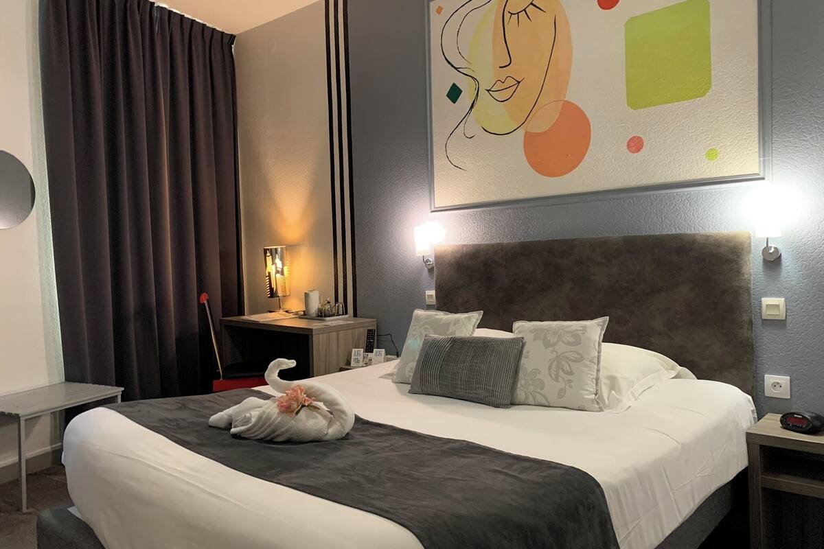 comfort double room | premium bedding, individually decorated, desk, blackout curtains