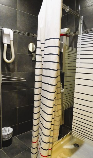 Shower, hydromassage showerhead, towels