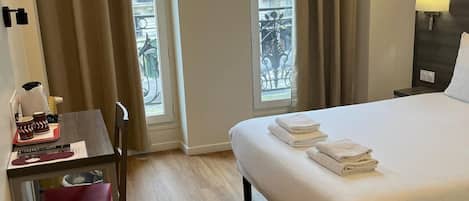 Desk, iron/ironing board, free WiFi, bed sheets